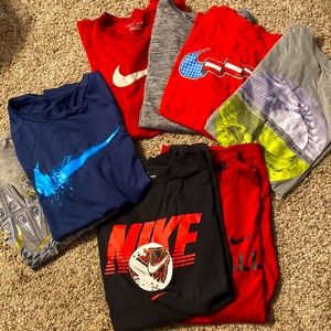 7 Nike t-shirts size 10/12